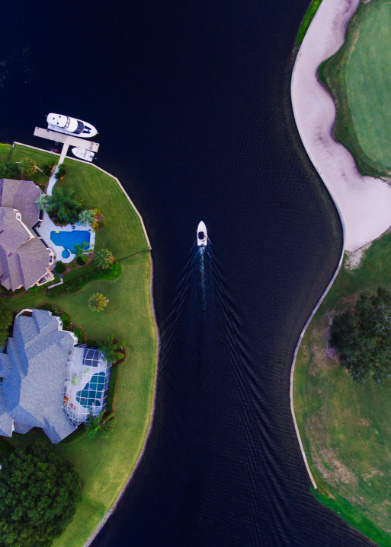 Aerial view of luxury homes and boats